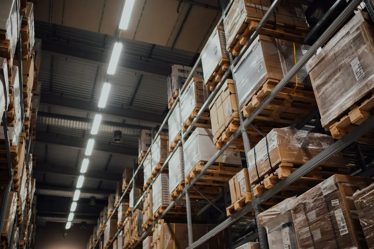 Warehouse racks stacked with cartons